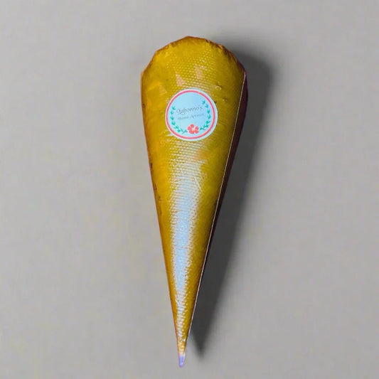 Single henna cone with label on neutral background, ready for temporary body art designs